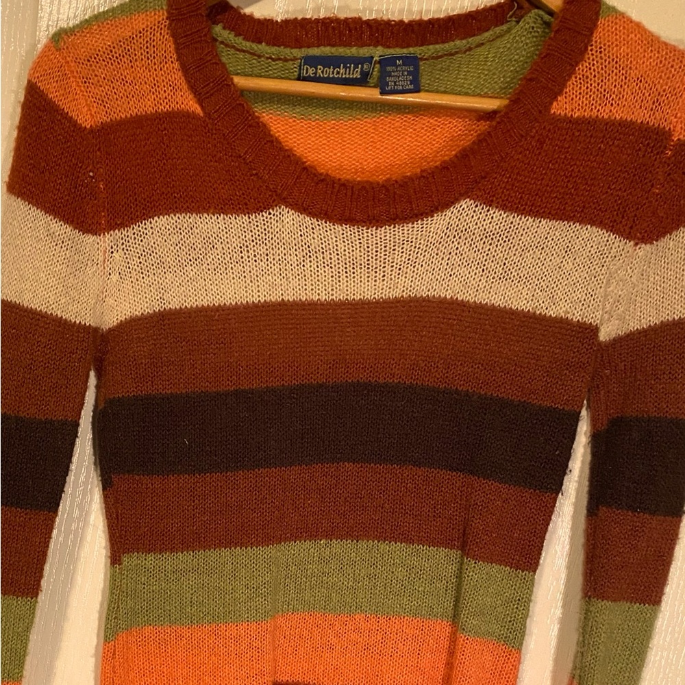 Women’s size med striped  fitted sweater, made by DeRotchild.